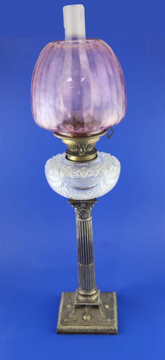 A late Victorian silver corinthian column Hinkss Duplex Patent oil lamp,